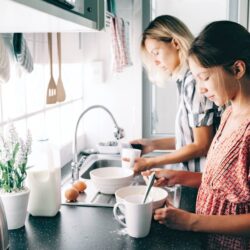 Child baking with mom